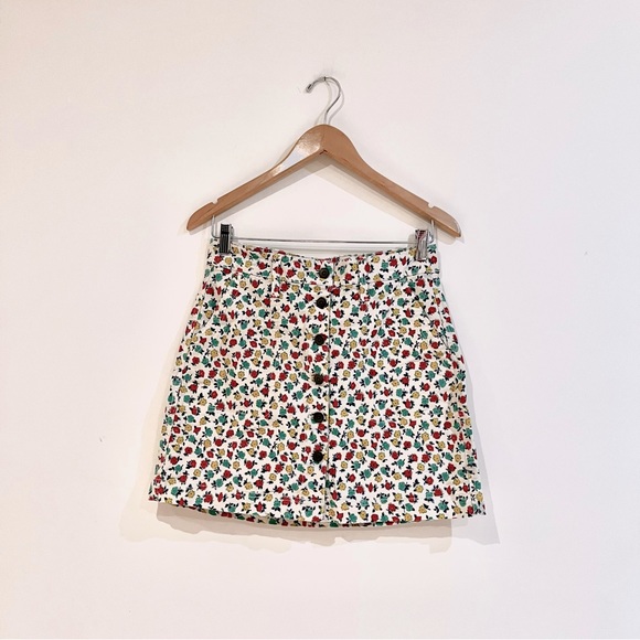 J.crew mercantile mini skirt with cream, red, yellow and green floral patterns. - Picture 1 of 7